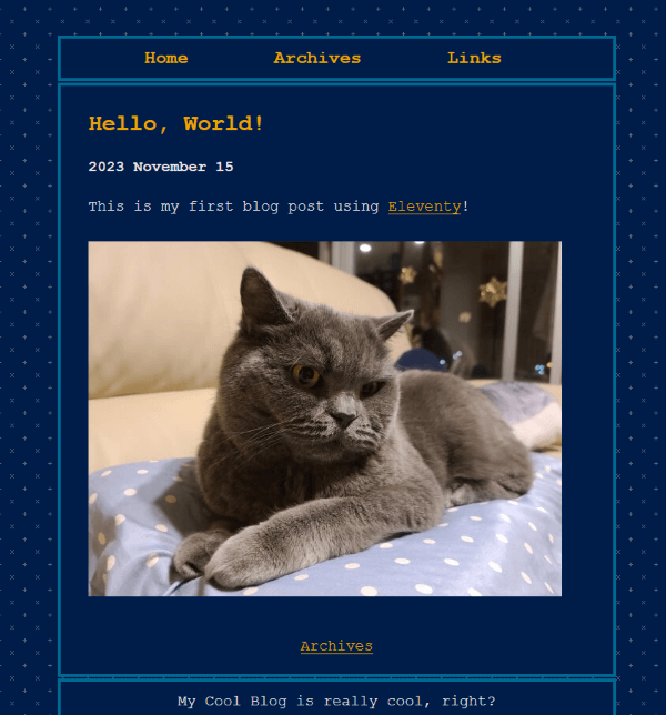 Blog entry of the aforementioned 2023-11-15-Hello-World.md with the picture of the gray cat on a blue pillow