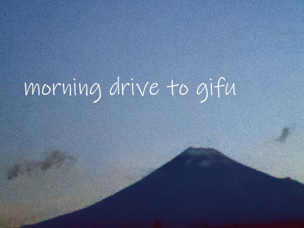 Grainy photo of Mt. Fuji in the early dawn.